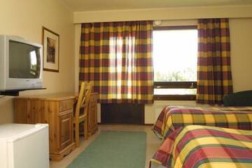 Фото номера Двухместный номер с 2 отдельными кроватями Мотели Motel Patalahti г. Йямся 9