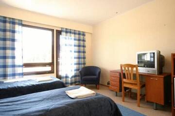 Фото номера Двухместный номер с 2 отдельными кроватями Мотели Motel Patalahti г. Йямся 16