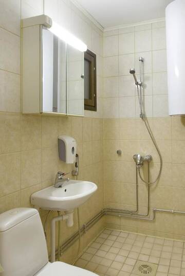 Фото номера Двухместный номер с 2 отдельными кроватями Мотели Motel Patalahti г. Йямся 12