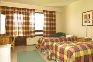 Фото номера Двухместный номер с 2 отдельными кроватями Мотели Motel Patalahti г. Йямся 18