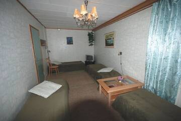 Фото номера Четырехместный номер Гостевой дом Jämsän Gasthaus г. Йямся 2