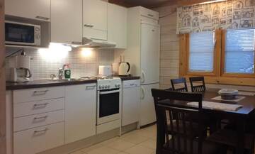 Фото номера Коттедж с 3 спальнями Дома для отпуска Himos Villi Cottages г. Йямся 9